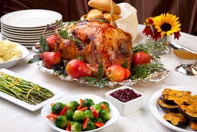 7408748-delicious-roasted-turkey-with-savory-vegetable-side-dishes-in-a-fall-theme.jpg
